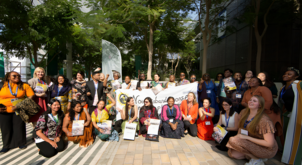 three representatives from the 2023 award-winning organizations accept the Gender Just Climate Solutions Awards