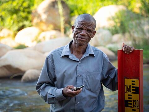 Stephen measures the level of the river twice per day