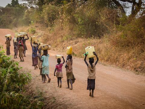 African children walking to collect water